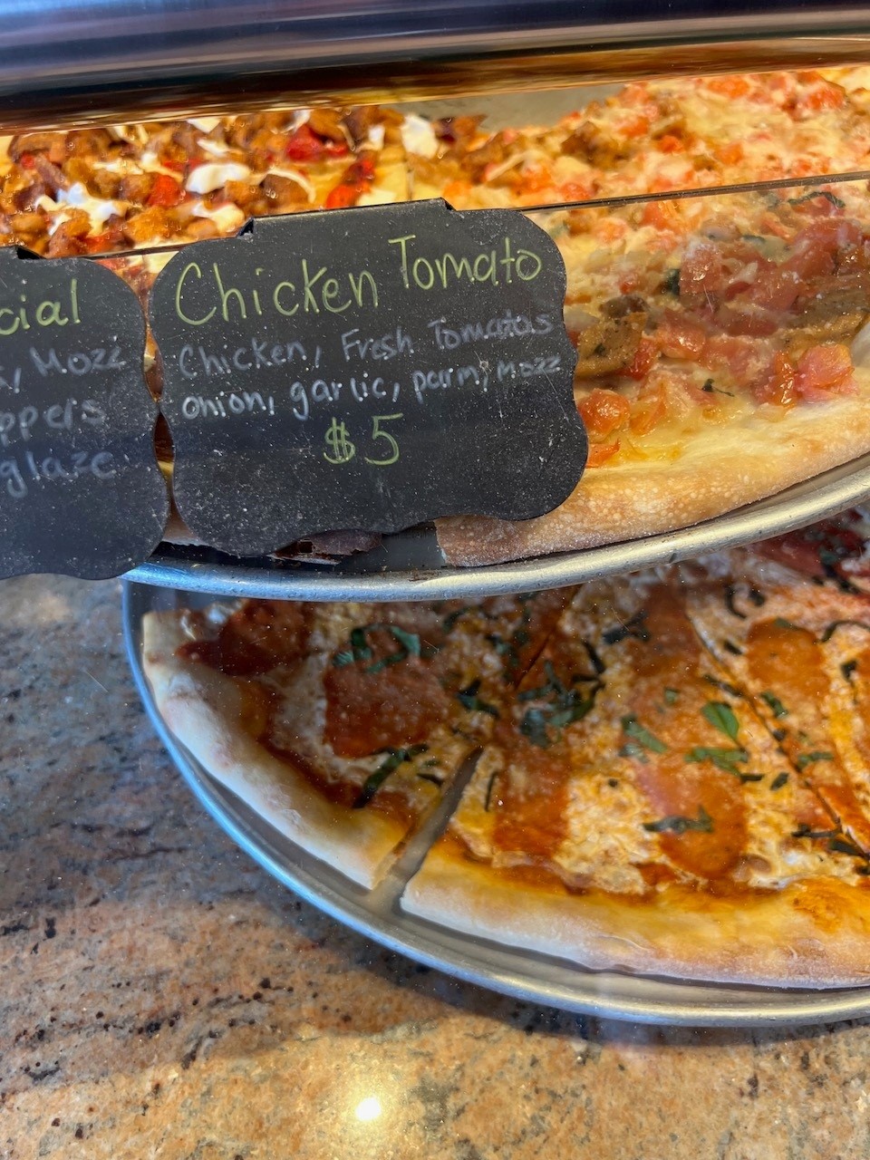 Selection of slices available at AvenUe Pizza