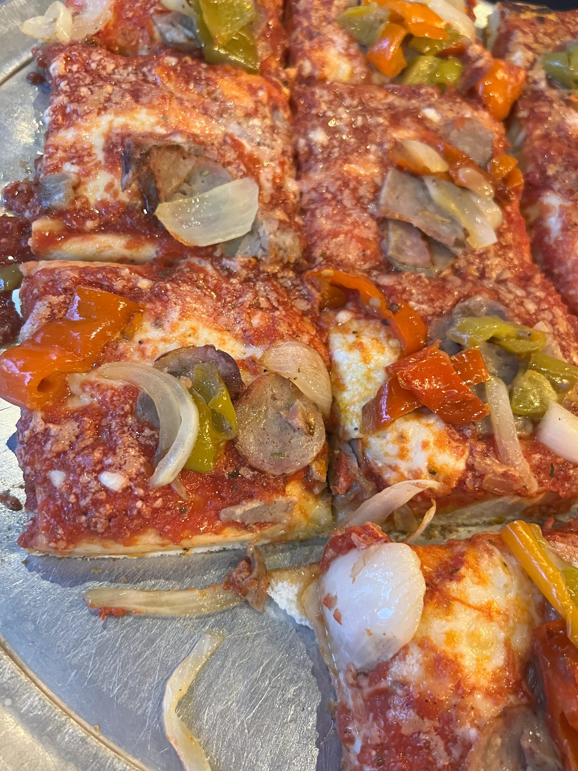 Sausage , pepper and onion Sicilian pizza at L&B Spumoni Gardens in Bensonhurst, Brooklyn