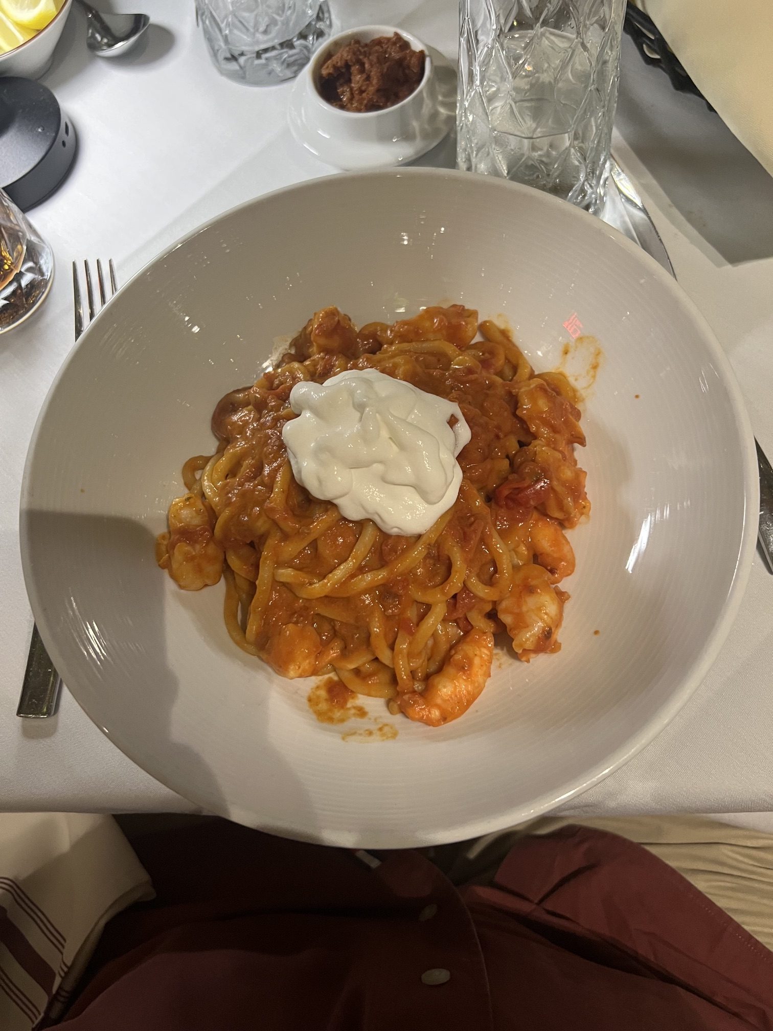 Homemade spaghetti with spicy nduja burrata foam and shrimp at L'Incontro by Rocco