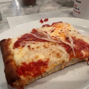No visit to a pizza shop is complete without trying their Sicilian slice