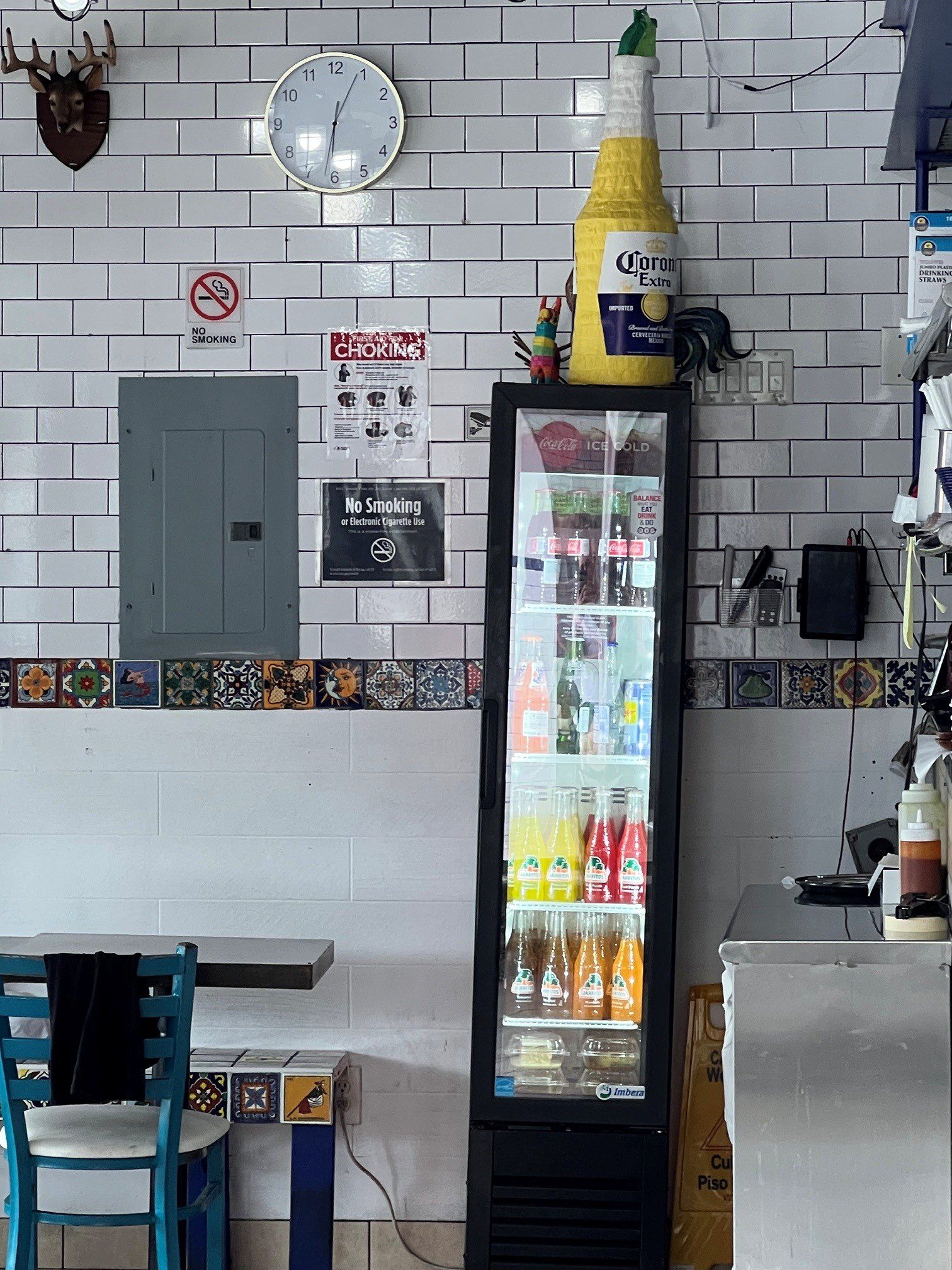 A refrigerator full of Mexican sodas, including full cane sugar Coke.
