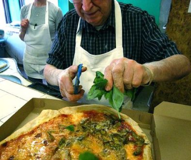 A hallmark of modern pizza started at DiFara, snipping fresh basil on the pie as soon as it comes out of the oven.