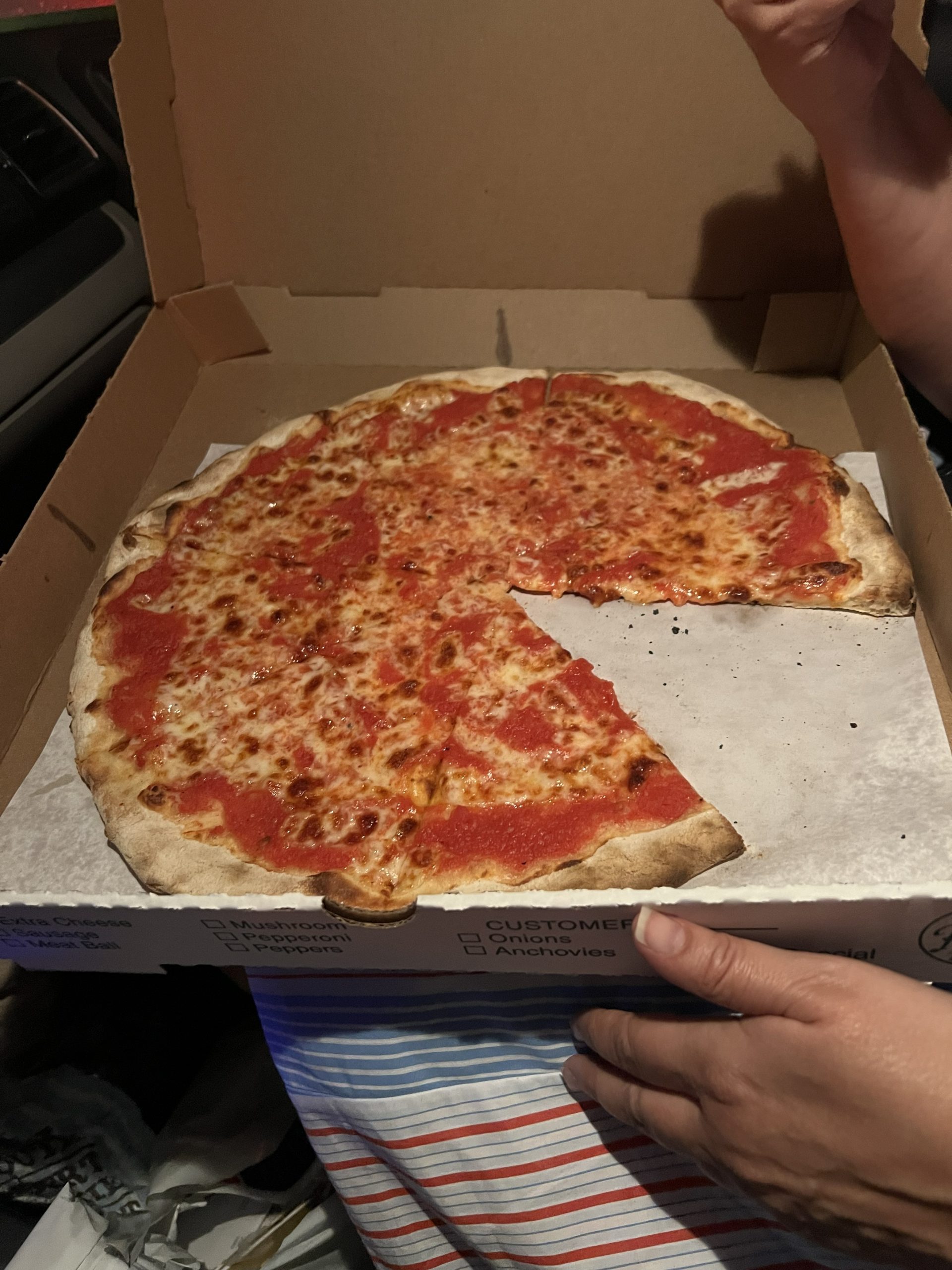 patsys-plain-pizza-harlem While a picture of the entire pie might be nice, there is no way to open that box and not grab a slice. First things first, always.