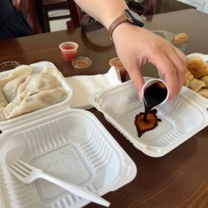 At our 2nd stop, Kai Feng Fu Dumpling House. Pouring some dipping sauce for our dumpling order.