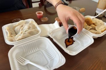 At our 2nd stop, Kai Feng Fu Dumpling House. Pouring some dipping sauce for our dumpling order.